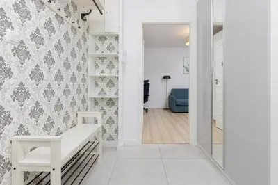Łóżko lub łóżka w pokoju w obiekcie Warsaw Portofino Apartment by Noclegi Renters