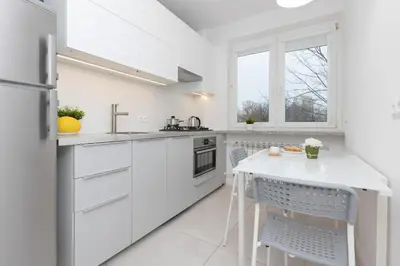Kuchnia lub aneks kuchenny w obiekcie Warsaw Portofino Apartment by Noclegi Renters