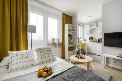 Telewizja i/lub zestaw kina domowego w obiekcie Apartments Centre by Arrenda