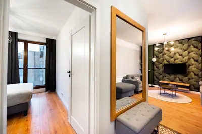 Część wypoczynkowa w obiekcie Grzybowska Luxury Apartment by BookingHost