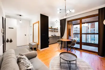 Część wypoczynkowa w obiekcie Grzybowska Luxury Apartment by BookingHost
