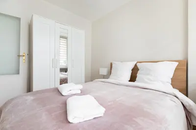 Łóżko lub łóżka w pokoju w obiekcie P&O Apartments Gamerskiego