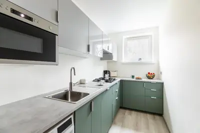 Kuchnia lub aneks kuchenny w obiekcie P&O Apartments Gamerskiego
