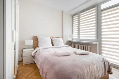 Łóżko lub łóżka w pokoju w obiekcie P&O Apartments Gamerskiego