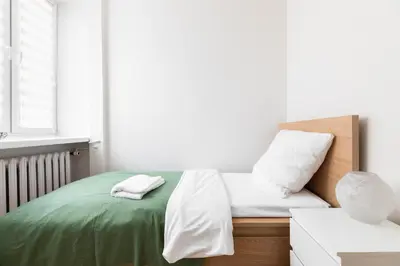 Łóżko lub łóżka w pokoju w obiekcie P&O Apartments Gamerskiego