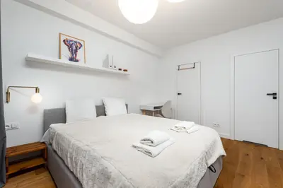 Łóżko lub łóżka w pokoju w obiekcie Pory 57 by Homeprime