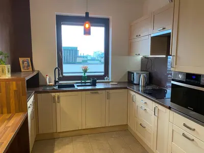 Kuchnia lub aneks kuchenny w obiekcie Sunny Life Apartment