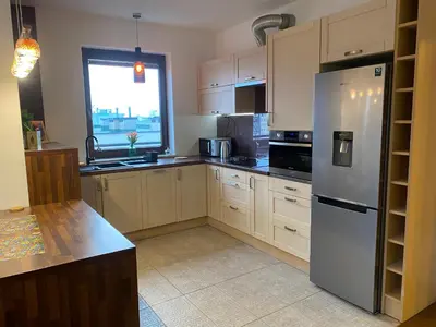 Kuchnia lub aneks kuchenny w obiekcie Sunny Life Apartment