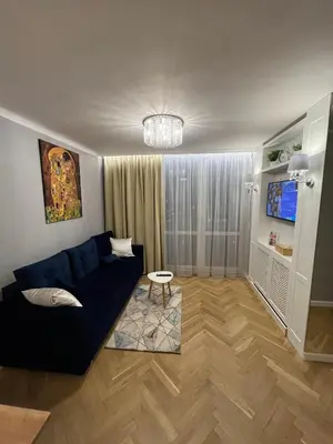 Telewizja i/lub zestaw kina domowego w obiekcie Apartament w Centrum Warszawy III