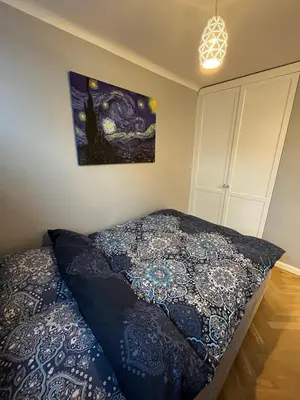 Łóżko lub łóżka w pokoju w obiekcie Apartament w Centrum Warszawy III