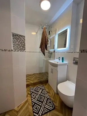 Łazienka w obiekcie Apartament w Centrum Warszawy III