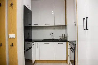 Kuchnia lub aneks kuchenny w obiekcie ApartamentySnu, Wola Premium I z parkingiem