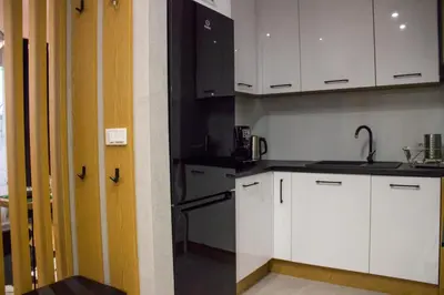 Kuchnia lub aneks kuchenny w obiekcie ApartamentySnu, Wola Premium I z parkingiem