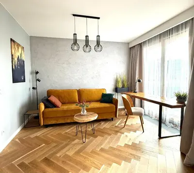 Część wypoczynkowa w obiekcie ApartamentySnu, Wola Premium I z parkingiem