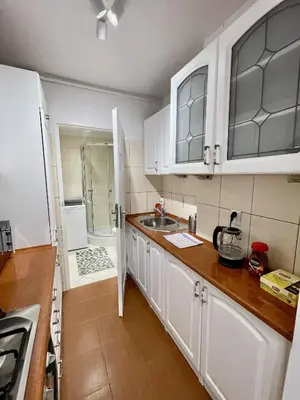 Kuchnia lub aneks kuchenny w obiekcie HOLIDAY 4 metro WiFi 70'TV Netflix Disney AppleTV