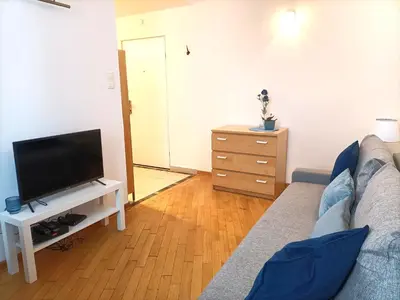 Telewizja i/lub zestaw kina domowego w obiekcie Rental Apartment Trębacka