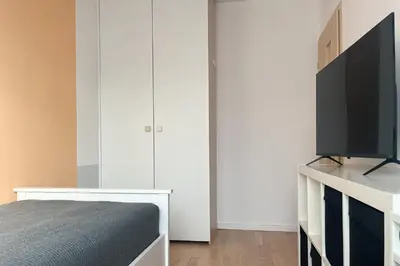 Telewizja i/lub zestaw kina domowego w obiekcie Shape&Color premium Hostel