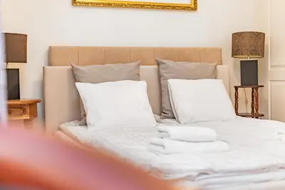 Łóżko lub łóżka w pokoju w obiekcie Aleja Jana Pawła II 80 by Homeprime