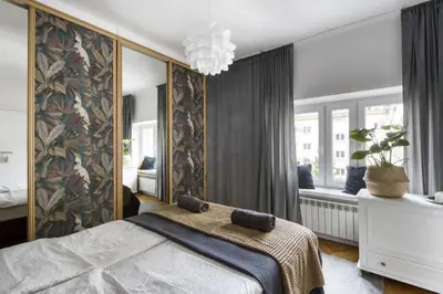 Łóżko lub łóżka w pokoju w obiekcie Parrot Dream City Center