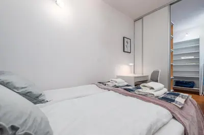 Łóżko lub łóżka w pokoju w obiekcie Wiartel 8 by Homeprime