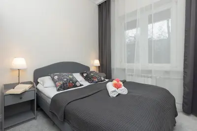 Łóżko lub łóżka w pokoju w obiekcie Warszawa Ochota Modern Apartment for Families by Noclegi Renters