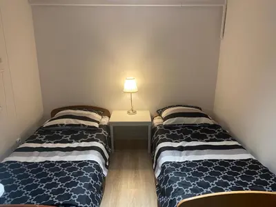 Łóżko lub łóżka w pokoju w obiekcie Pokoje Gościnne Ząbki k. Warszawy