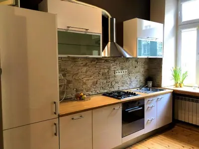 Kuchnia lub aneks kuchenny w obiekcie Wilcza 54 Prywatne mieszkanie z balkonem w Centrum 400m od Dworca Centralnego Samodzielne Zameldowanie! Self Check-in System!