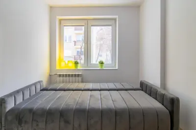 Łóżko lub łóżka w pokoju w obiekcie W sercu Powiśla, Balkon, Klimatyzacja, WiFi, brak TV