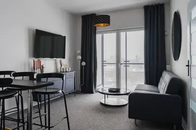 Telewizja i/lub zestaw kina domowego w obiekcie Warsaw Concierge EXPO XXI