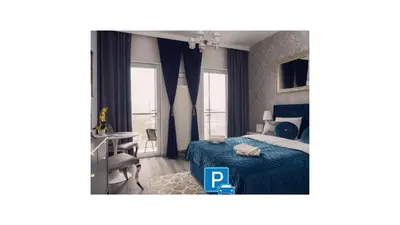 Łóżko lub łóżka w pokoju w obiekcie Prymasa Tysiąclecia 83A City Center Viev Free Garage By Perfect Apart 1118