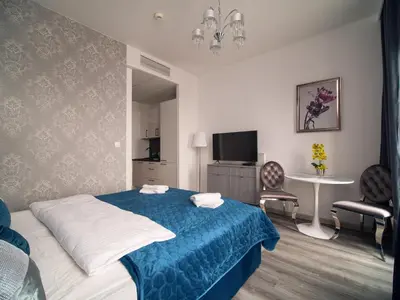Łóżko lub łóżka w pokoju w obiekcie Prymasa Tysiąclecia 83A City Center Viev Free Garage By Perfect Apart 1118