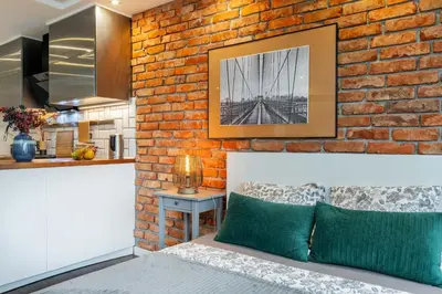 Kuchnia lub aneks kuchenny w obiekcie Chmielna 106B Centrum by VAYA STAYS