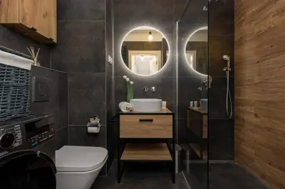 Łazienka w obiekcie Raków Apartments Szczęśliwicki Park Warsaw by Noclegi Renters