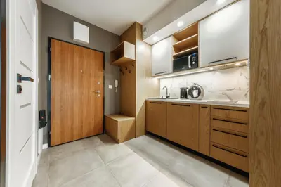 Kuchnia lub aneks kuchenny w obiekcie Apartament na Woli, nowe osiedle Jana Kazimierza 32, szybkie WI-FI, Parking
