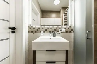 Łazienka w obiekcie Apartament na Woli, nowe osiedle Jana Kazimierza 32, szybkie WI-FI, Parking