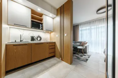 Kuchnia lub aneks kuchenny w obiekcie Apartament na Woli, nowe osiedle Jana Kazimierza 32, szybkie WI-FI, Parking