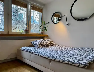Łóżko lub łóżka w pokoju w obiekcie K22 Apartments centrum Warszawy