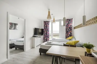 Łóżko lub łóżka w pokoju w obiekcie Labo Apartment Graniczna
