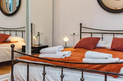 Łóżko lub łóżka w pokoju w obiekcie Nowy Świat 47a by Homeprime