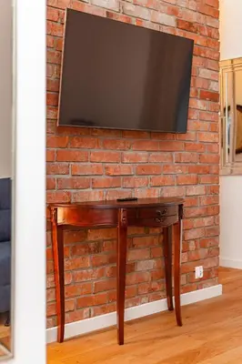 Telewizja i/lub zestaw kina domowego w obiekcie Nowy Świat 47a by Homeprime