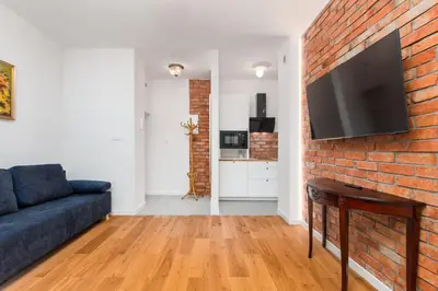 Telewizja i/lub zestaw kina domowego w obiekcie Nowy Świat 47a by Homeprime