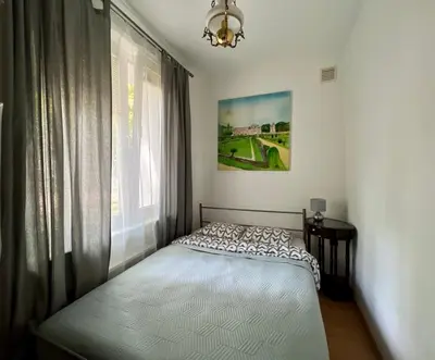 Łóżko lub łóżka w pokoju w obiekcie K22 Mokotów Classik Aparts