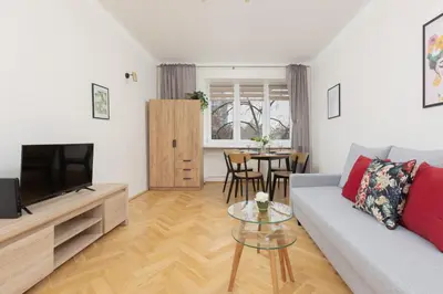 Telewizja i/lub zestaw kina domowego w obiekcie Białe Aleje Mokotów Apartment Metro by Noclegi Renters