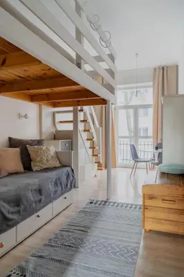 Łóżko lub łóżka w pokoju w obiekcie Warsaw Concierge Wilanowska