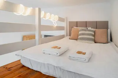 Łóżko lub łóżka w pokoju w obiekcie Warsaw Concierge Wilanowska