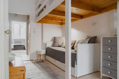 Łóżko lub łóżka w pokoju w obiekcie Warsaw Concierge Wilanowska