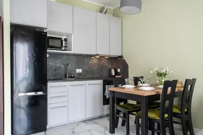 Kuchnia lub aneks kuchenny w obiekcie Prymasa Tysiąclecia 83A Separate Bedroom Free Garage By Perfect Apart 634 & 635