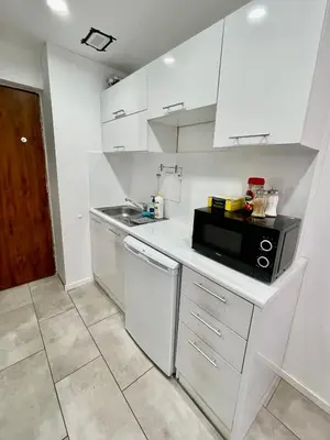 Kuchnia lub aneks kuchenny w obiekcie PALACE 3 WiFi 65'TV Netflix HBO Disney AppletTV