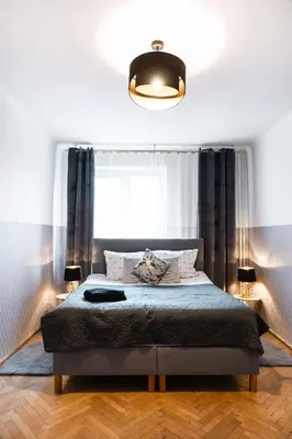 Łóżko lub łóżka w pokoju w obiekcie ClickTheFlat Wilcza 35 City Center Apart Rooms