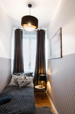 Łóżko lub łóżka w pokoju w obiekcie ClickTheFlat Wilcza 35 City Center Apart Rooms